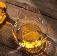 Load image into Gallery viewer, Side view of brandy Irish whiskey glass – premium curved design barware accessory for sipping spirits