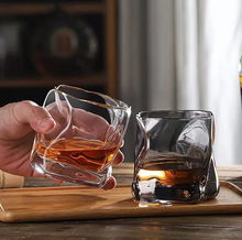 Load image into Gallery viewer, Side view of Japanese twist whiskey glass – innovative spiral shape barware accessory for premium drinks