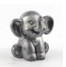 Load image into Gallery viewer, Pewter Elephant Money Bank | Engraver in Canada | Gift Shop in Calgary | Unique keepsake | Handcrafted pewter | Elephant figurine | Coin savings | Decorative money bank | Artisanal craftsmanship | Animal lover&#39;s delight | Savings decor | Canadian craftsmanship | Calgary gift idea | Premium pewter | Functional art | Home decor accent | Elephant themed gift | Hand-engraved detail | Calgary souvenir | Practical elegance
