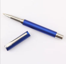 Load image into Gallery viewer, Blue pen with silver accents on a white background