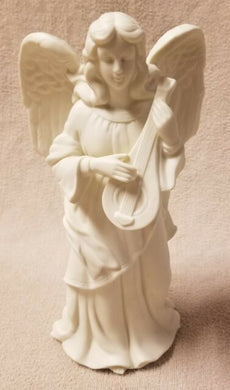 Bisque angel candle holder- religious gifts in Canada