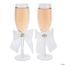 Load image into Gallery viewer, Wedding Toast glasses | Wedding Gifts in Calgary | Buy gifts from Engraving Reimagined | Gift store in Canada | Online gift store in Canada | Gift store in Calgary | Online gifts store in Calgary | Wedding gifts in Canada | Wedding gifts in Calgary | Two Hearts Wedding Toasting Glass Champagne Flutes | Elegant champagne flutes with two heart design | Wedding toasting glasses set | Personalized champagne glasses for weddings | Engraved toasting flutes for special occasions
