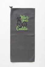 Load image into Gallery viewer, A dark gray golf towel , featuring a black graphic of a golf bag, club, and golf ball with the text 'Who's Your Caddie' in bright green script, shown against a plain white background.
