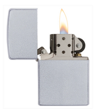 Load image into Gallery viewer, A classic Zippo-style lighter with a textured silver metal finish, shown open with a visible flame burning, isolated on a white background.
