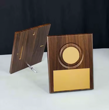 Load image into Gallery viewer, Walnut wood plaque with circular emblem
