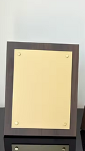 Load image into Gallery viewer, Walnut wood plaque with Gold plate screw detail
