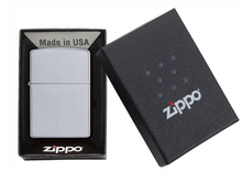 Load image into Gallery viewer, A silver Zippo lighter displayed next to its black presentation box, with the lighter inside an open box labeled 'Made in USA' and the closed lid showing the Zippo logo.
