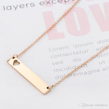 Load image into Gallery viewer, Personalized gold stainless steel bar necklace with heart cut-out – a stylish engraved gift for birthdays, anniversaries, and special occasions.
