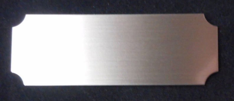 Silver notched trophy name plate