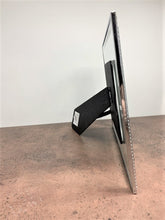 Load image into Gallery viewer, Close-up of silver trim glass 4x6 photo frame – sleek stylish keepsake frame for cherished memories
